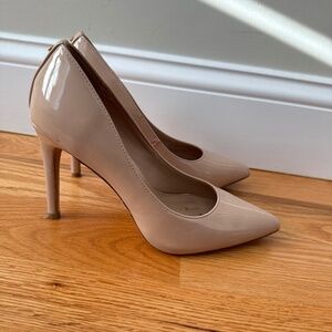 Nude pencil heels; size 7